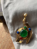 The Heraldic Emerald Cabochon Brooch