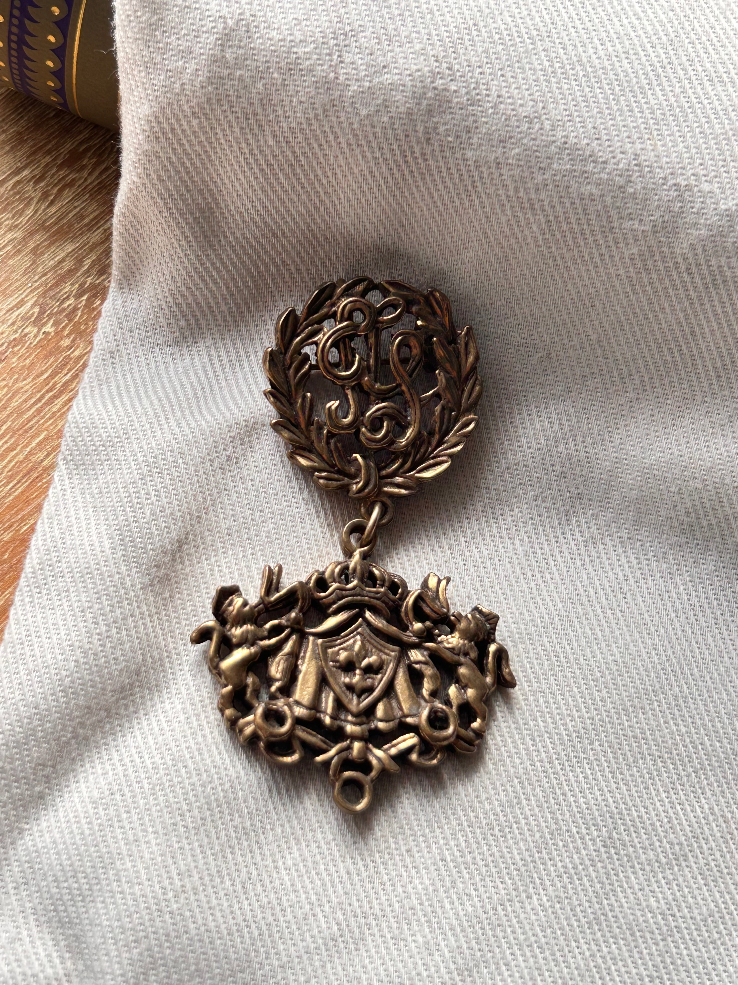 The Old World Crest