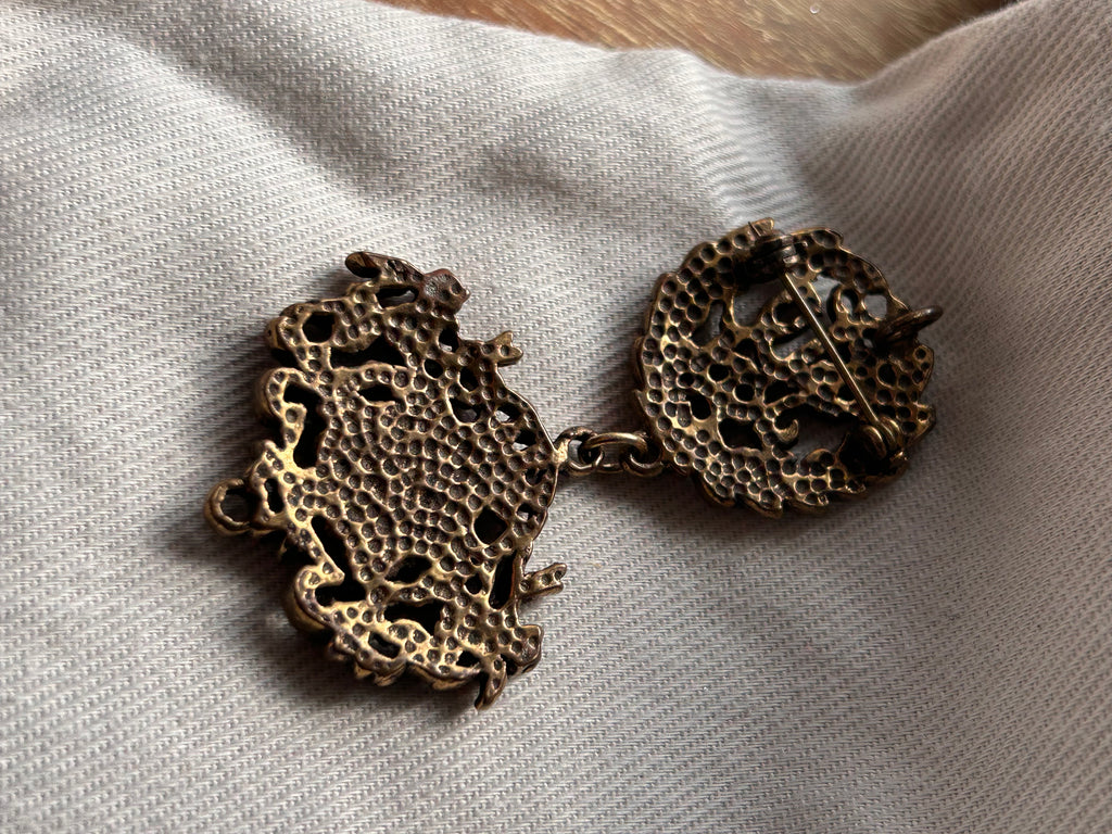 The Old World Crest