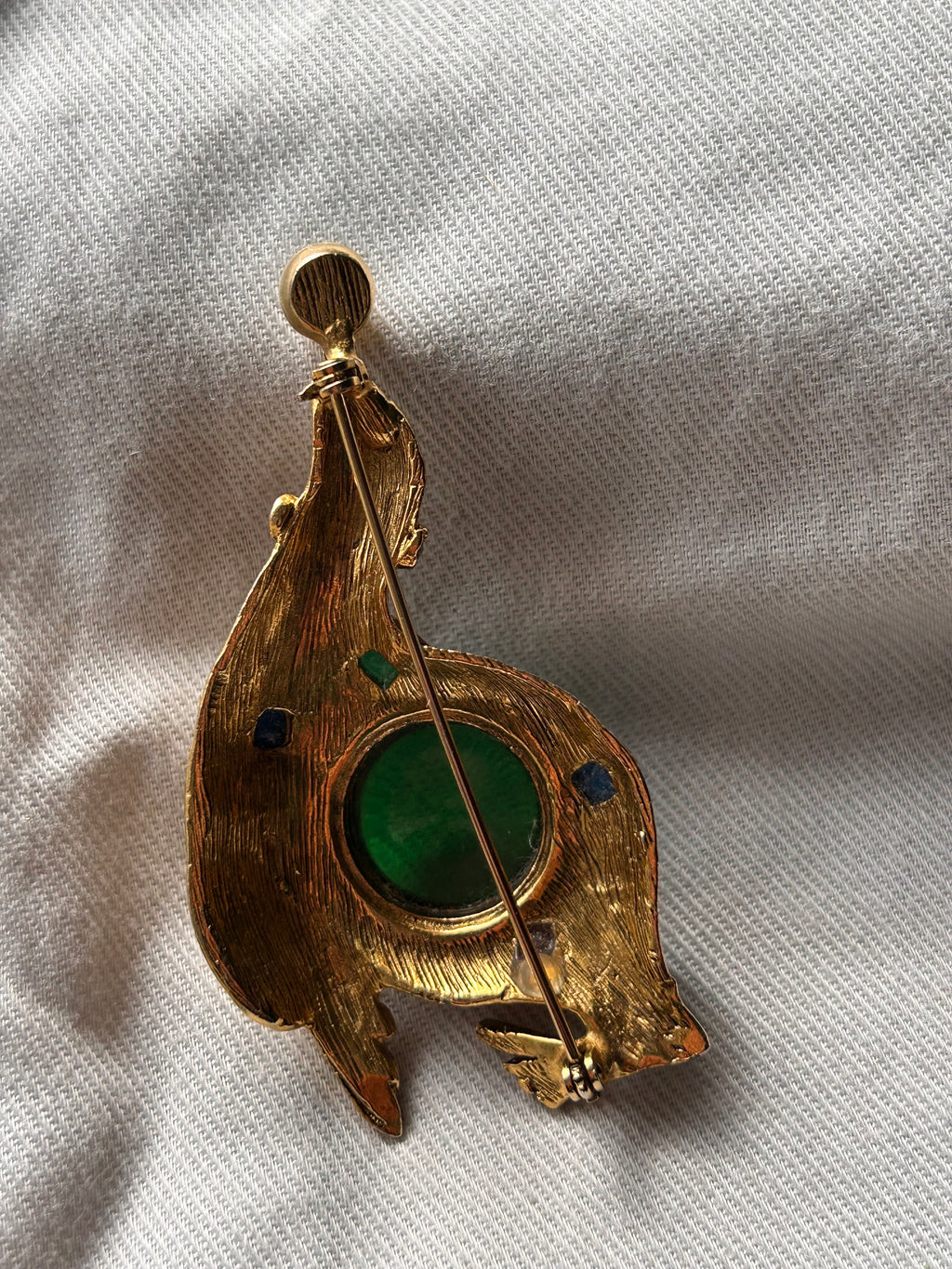 The Heraldic Emerald Cabochon Brooch